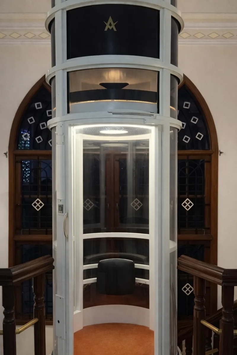 Airo foldable leather seat inside the lift cabin